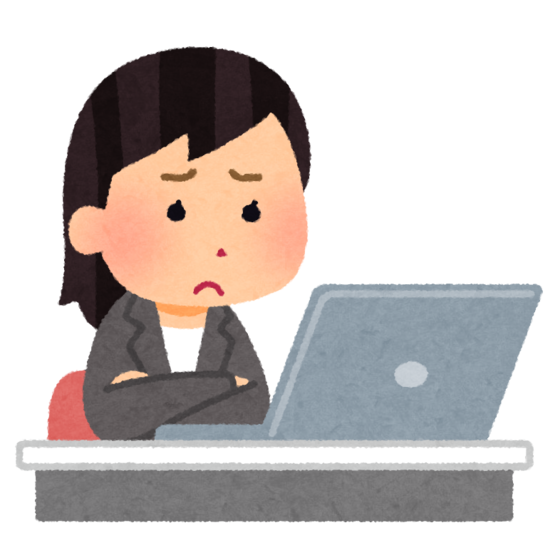 パソコンの前で困るビジネスウーマン